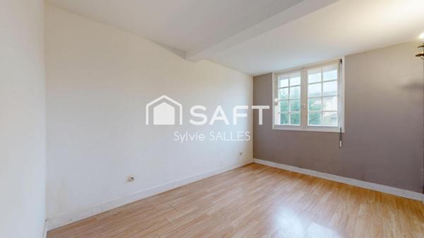 Maison mitoyenne, offrant 2 logements indépendants