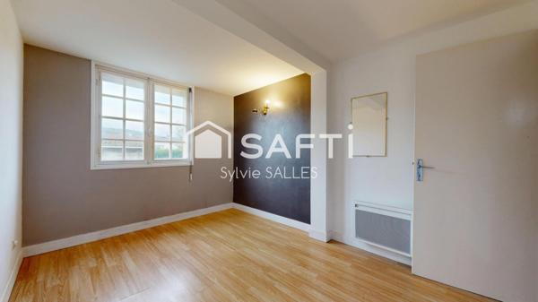 Maison mitoyenne, offrant 2 logements indépendants