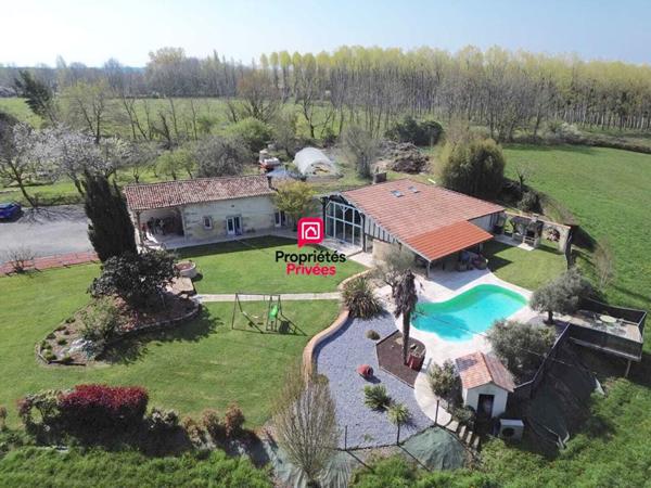 Propriété en pierre 273m² - Piscine chauffée - Atelier - 4,7 ha