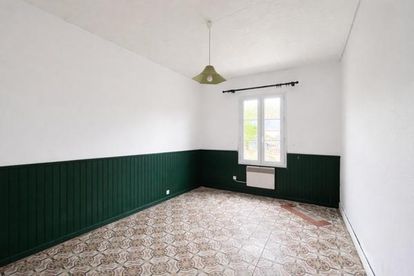 Maison à rénover sur terrain constructible