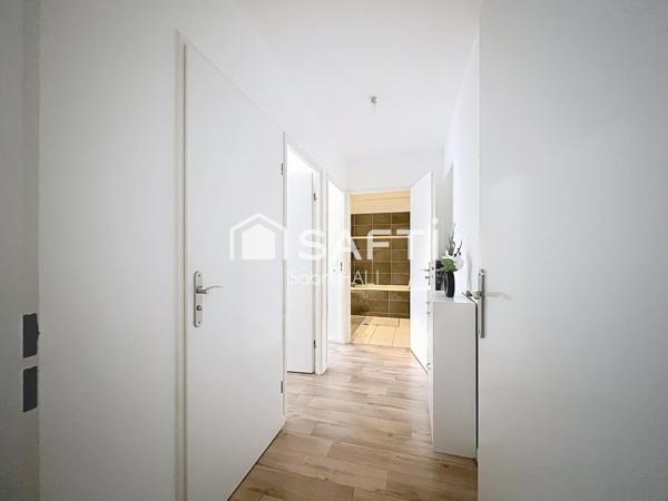 Appartement 3 pièces de 64m², immeuble de standing avec jardin et terrasse de 52m², exposé Sud-Ouest