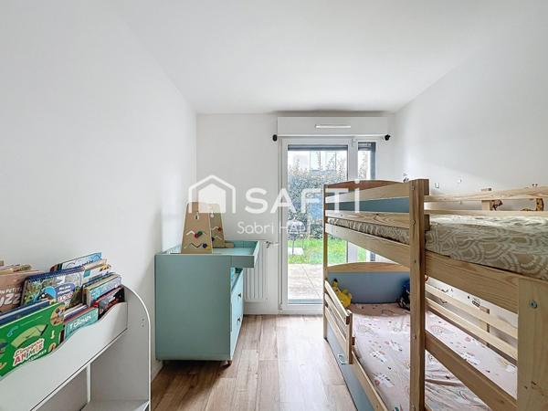 Appartement 3 pièces de 64m², immeuble de standing avec jardin et terrasse de 52m², exposé Sud-Ouest