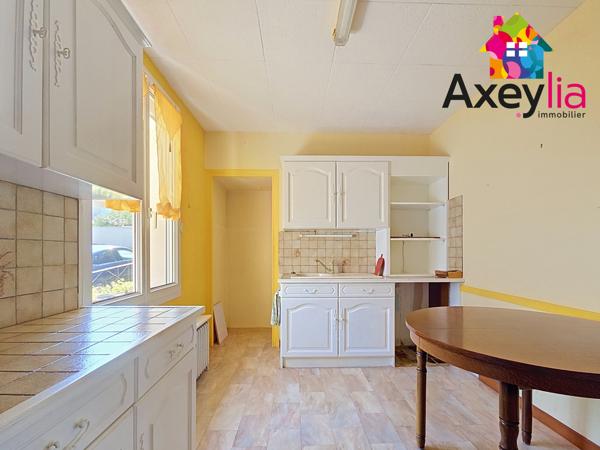 A VENDRE - ROANNE - MAISON SUR SOUS SOL AVEC GRAND GARAGE INDEPENDANT