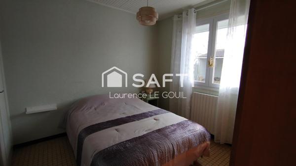 MAISON DE PLAIN PIED AVEC DOUBLE GARAGE DANS QUARTIER CALME