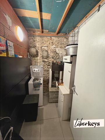 Maison T4 de 95 m² vendue louée avec terrasse de 50 m² et parking couvert