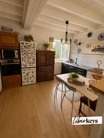 Maison T4 de 95 m² vendue louée avec terrasse de 50 m² et parking couvert