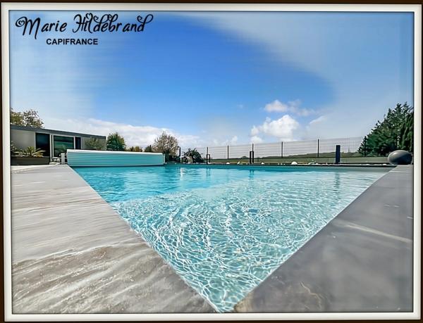 Villa contemporaine 134m² habitables avec piscine, séjour cathédrale, vue dégagée, jardin et double garage