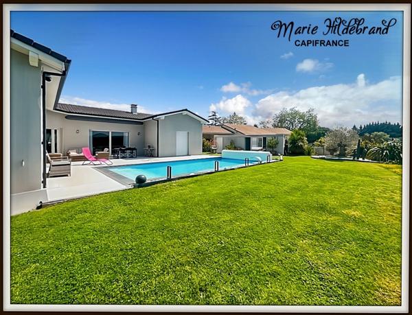 Villa contemporaine 134m² habitables avec piscine, séjour cathédrale, vue dégagée, jardin et double garage