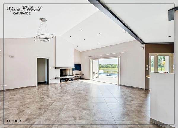Villa contemporaine 134m² habitables avec piscine, séjour cathédrale, vue dégagée, jardin et double garage