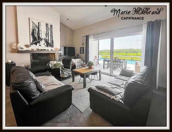 Villa contemporaine 134m² habitables avec piscine, séjour cathédrale, vue dégagée, jardin et double garage