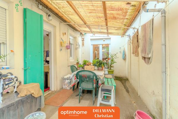 Maison Jumelée avec garage et jardin clos