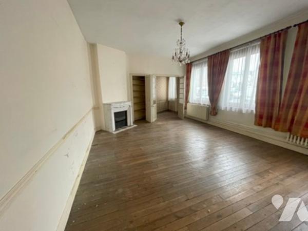 UNE MAISON A USAGE D'HABITATION