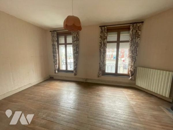 UNE MAISON A USAGE D'HABITATION