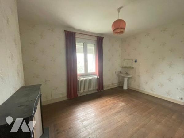 UNE MAISON A USAGE D'HABITATION