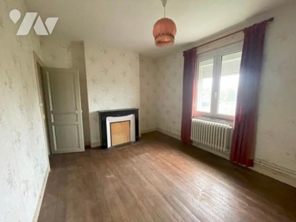 UNE MAISON A USAGE D'HABITATION