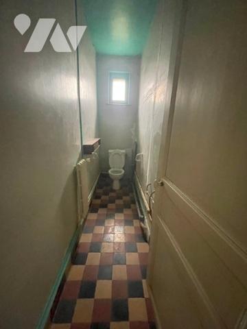 UNE MAISON A USAGE D'HABITATION