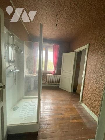 UNE MAISON A USAGE D'HABITATION