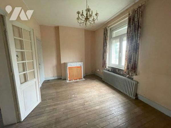 UNE MAISON A USAGE D'HABITATION