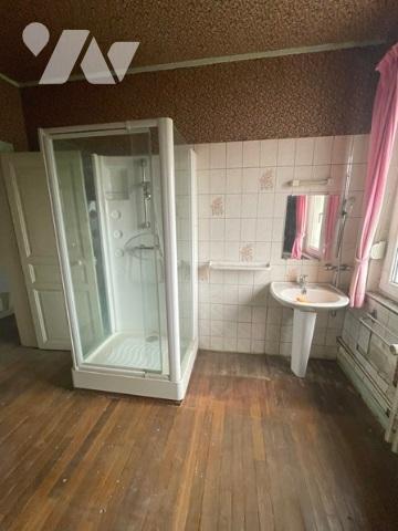 UNE MAISON A USAGE D'HABITATION