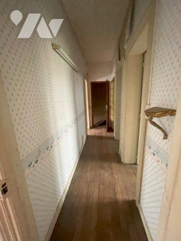 UNE MAISON A USAGE D'HABITATION