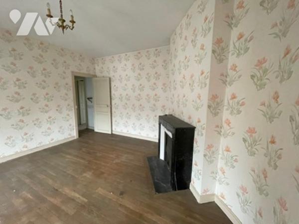 UNE MAISON A USAGE D'HABITATION