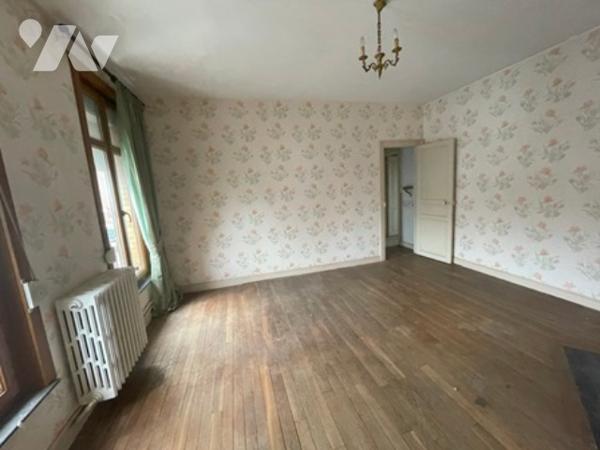 UNE MAISON A USAGE D'HABITATION