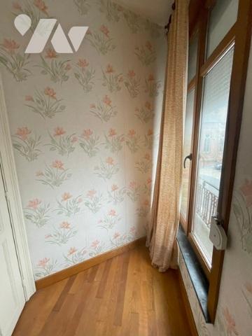 UNE MAISON A USAGE D'HABITATION