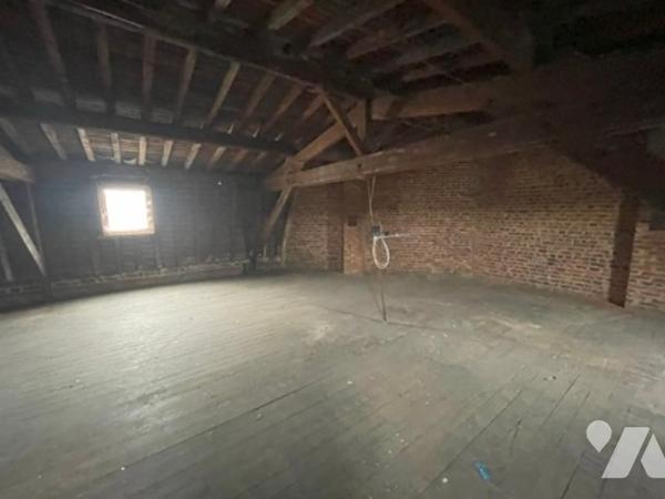 UNE MAISON A USAGE D'HABITATION