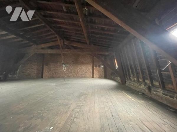 UNE MAISON A USAGE D'HABITATION