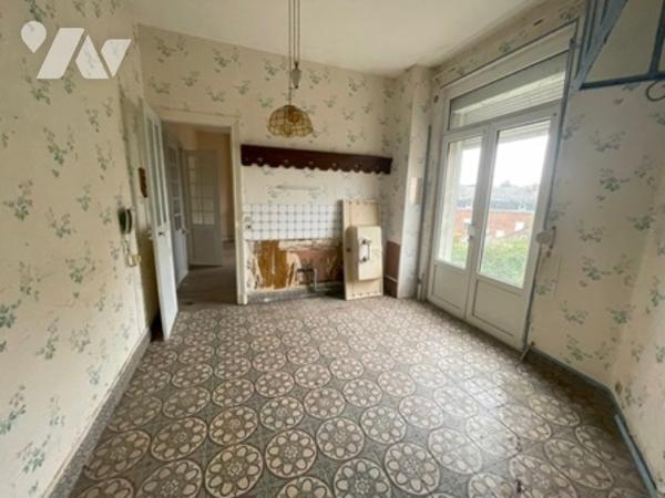 UNE MAISON A USAGE D'HABITATION