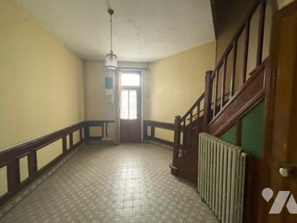 UNE MAISON A USAGE D'HABITATION