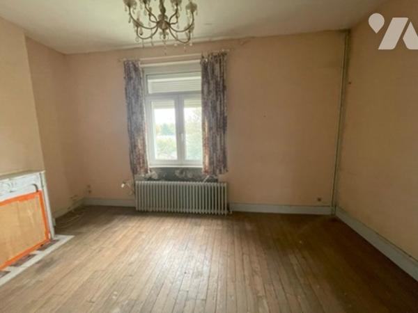 UNE MAISON A USAGE D'HABITATION