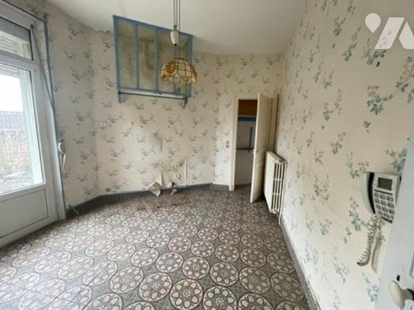 UNE MAISON A USAGE D'HABITATION