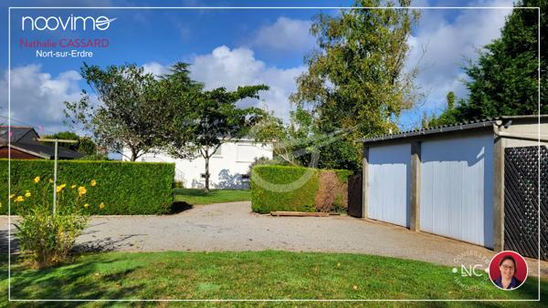 MAISON FAMILIALE de 131 m² 3 chambres, 1 bureau avec double-garage de 40 m² sur 1290 m²