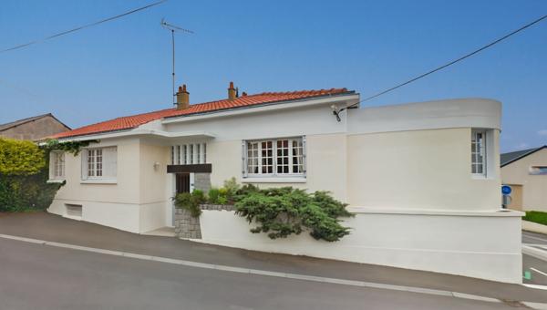 Maison sur sous-sol proche des commodités