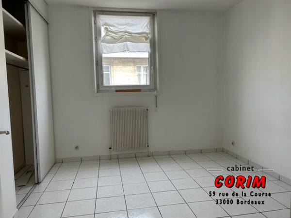 Immeuble de 2 appts (jardin + garage)