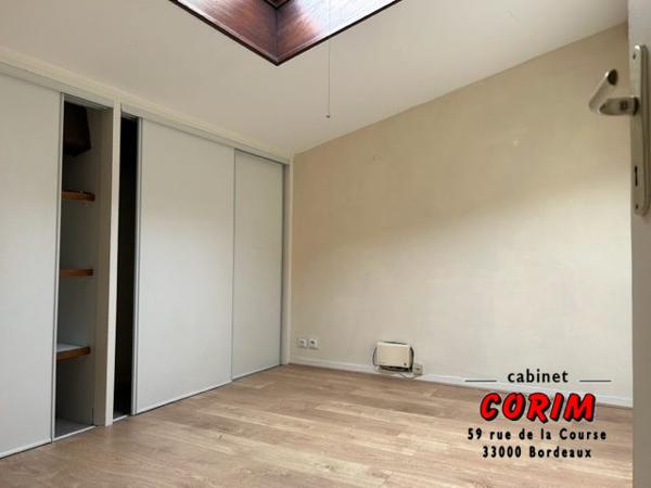 Immeuble de 2 appts (jardin + garage)