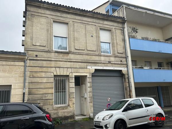 Immeuble de 2 appts (jardin + garage)