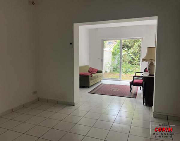 Immeuble de 2 appts (jardin + garage)