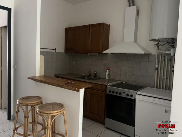 Immeuble de 2 appts (jardin + garage)
