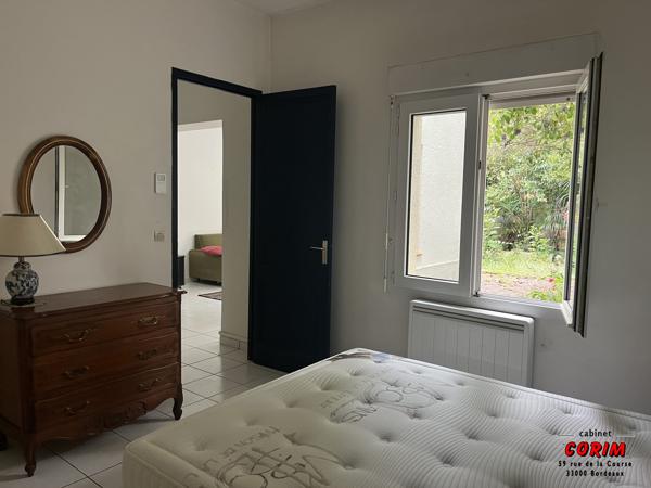 Immeuble de 2 appts (jardin + garage)