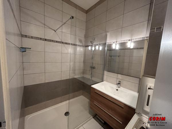 Immeuble de 2 appts (jardin + garage)