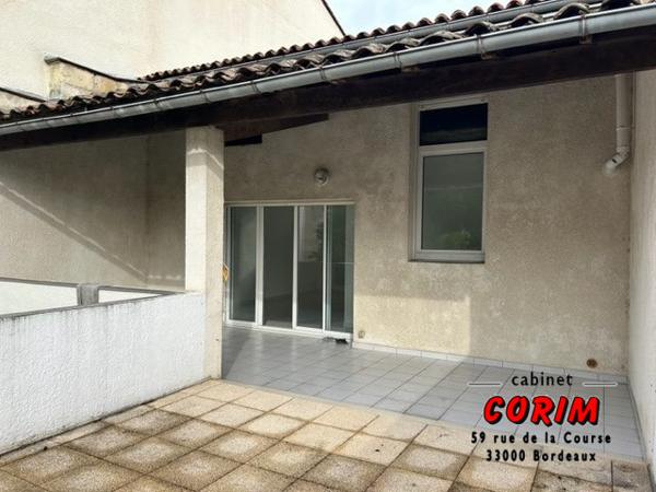 Immeuble de 2 appts (jardin + garage)