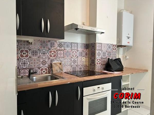 Immeuble de 2 appts (jardin + garage)