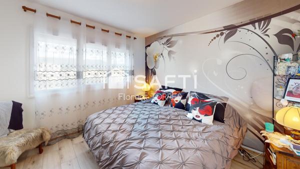 Appartement 86m² Faux T4 + stationnement privatif