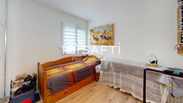 Appartement 86m² Faux T4 + stationnement privatif