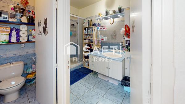 Appartement 86m² Faux T4 + stationnement privatif