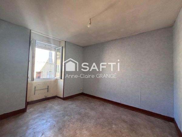 Maison de ville avec cave et courette ,idéal investisseur ou premier achat