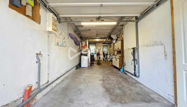 Maison de ville sur sous-sol complet avec véranda, jardin et garage à Épinal