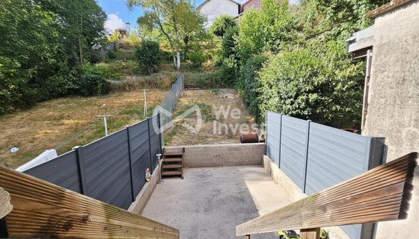 Maison de ville sur sous-sol complet avec véranda, jardin et garage à Épinal